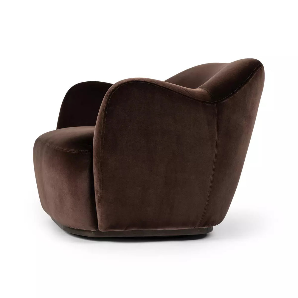 
                  
                    June Swivel Chair
                  
                